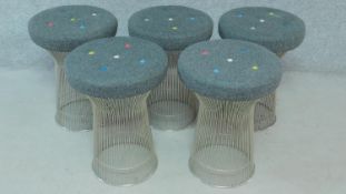 A set of five contemporary metal framed mushroom stools with multi colour buttoned seats. H.57cm