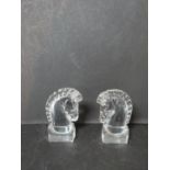 A pair of signed Art Deco Steuben crystal horses heads designed by Sidney Waugh. H12.5cm.