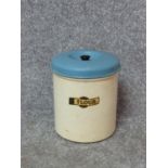 A collection of five vintage painted cream and blue kitchen cannisters and matching large flour tin.