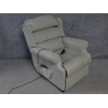 A Leggett & Platt reclining armchair with fully motorised back and footrest. H.105cm