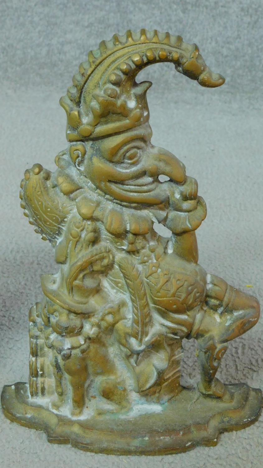 A pair of Victorian Punch and Judy brass door stops along with a repousse brass Christmas scene - Image 3 of 6