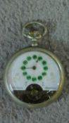 An antique green enamel French pocket watch with a central dial and green cloisonné enamel circles