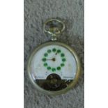 An antique green enamel French pocket watch with a central dial and green cloisonné enamel circles