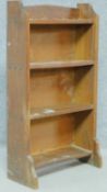 A mid 20th century oak open bookcase. H.99 W.56 D.23cm