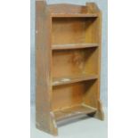 A mid 20th century oak open bookcase. H.99 W.56 D.23cm