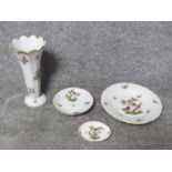 A collection of hand painted Herend porcelain pieces. Including a Queen Victoria design trumpet