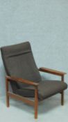 A mid 20th century teak framed armchair. H.90cm