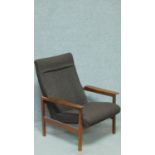 A mid 20th century teak framed armchair. H.90cm