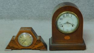 Two mahogany and inlaid mantle clocks. One Smith's electric Art Deco clock with abstract design