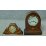 Two mahogany and inlaid mantle clocks. One Smith's electric Art Deco clock with abstract design