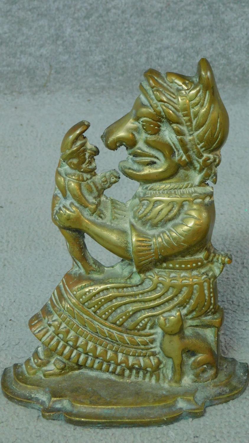 A pair of Victorian Punch and Judy brass door stops along with a repousse brass Christmas scene - Image 2 of 6