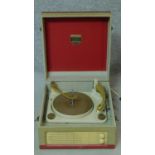 A vintage cased portable record player by Dansette. H.23 W.38 D.41cm