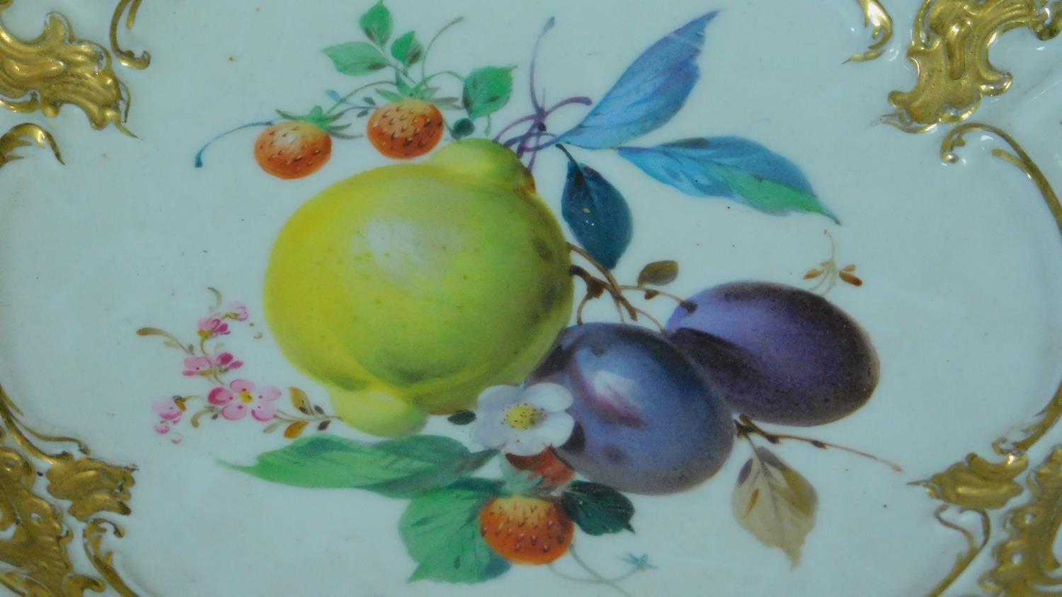 A Meissen handpainted and gilded fruit plate, with central cartouche depicting a lemon, plum, - Image 2 of 6