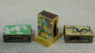 Three vintage Japanese Cloisonné enamel match box covers. One depicting a dragon on a pale yellow