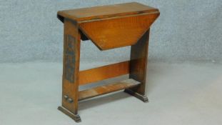 A vintage oak drop flap occasional table. H.64 W.60 D.60cm