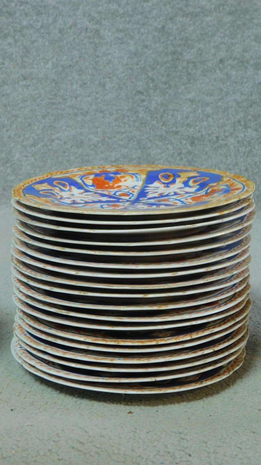 A collection of eighteen antique hand painted and gilded porcelain plates, three footed bowls and - Image 2 of 8