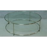 A contemporary metal framed glass topped low coffee table. H.33 W.100 D.100cm