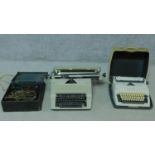 Two vintage typewriters, one from Gabriele 20 and the other from Adler, together with a antique