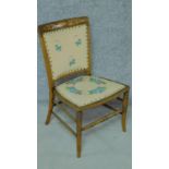 An Edwardian mahogany and satinwood inlaid dining chair with hand embroidered upholstery on turned