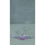 Three glass items. Including a Murano style mauve glass abstract centre piece bowl (possibly