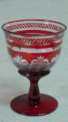 A large ruby cut to clear glass chalice by Laura Ashley. H.19 W.14 D.14cm