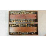 An antique Mahogany locking toolbox fitted with a set of wooden handled precision woodworking and