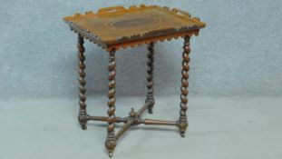 A 19th century Continental walnut tray top occasional table with inlaid top on barleytwist