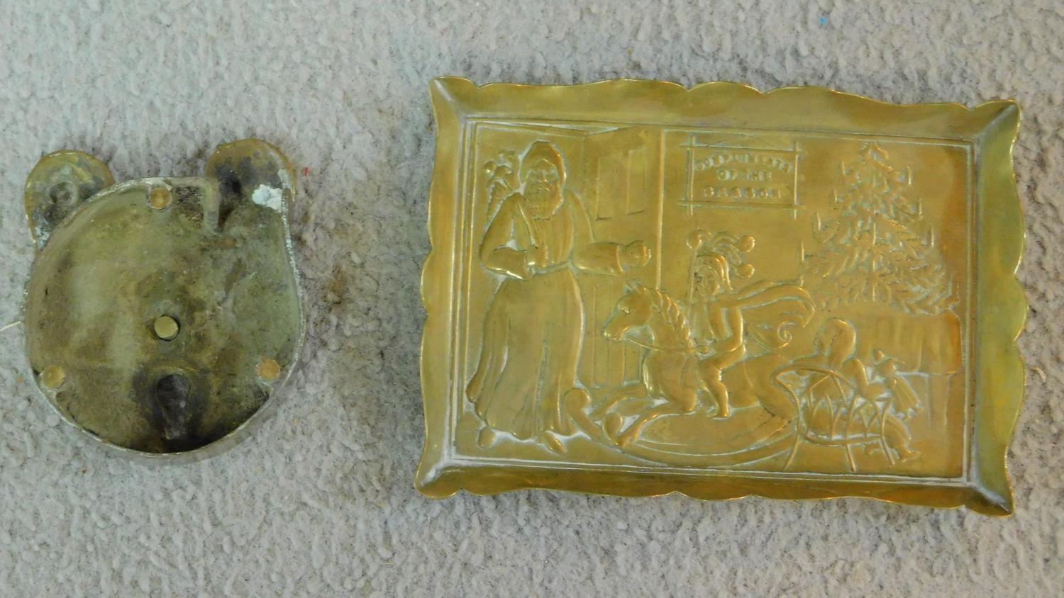 A pair of Victorian Punch and Judy brass door stops along with a repousse brass Christmas scene - Image 6 of 6