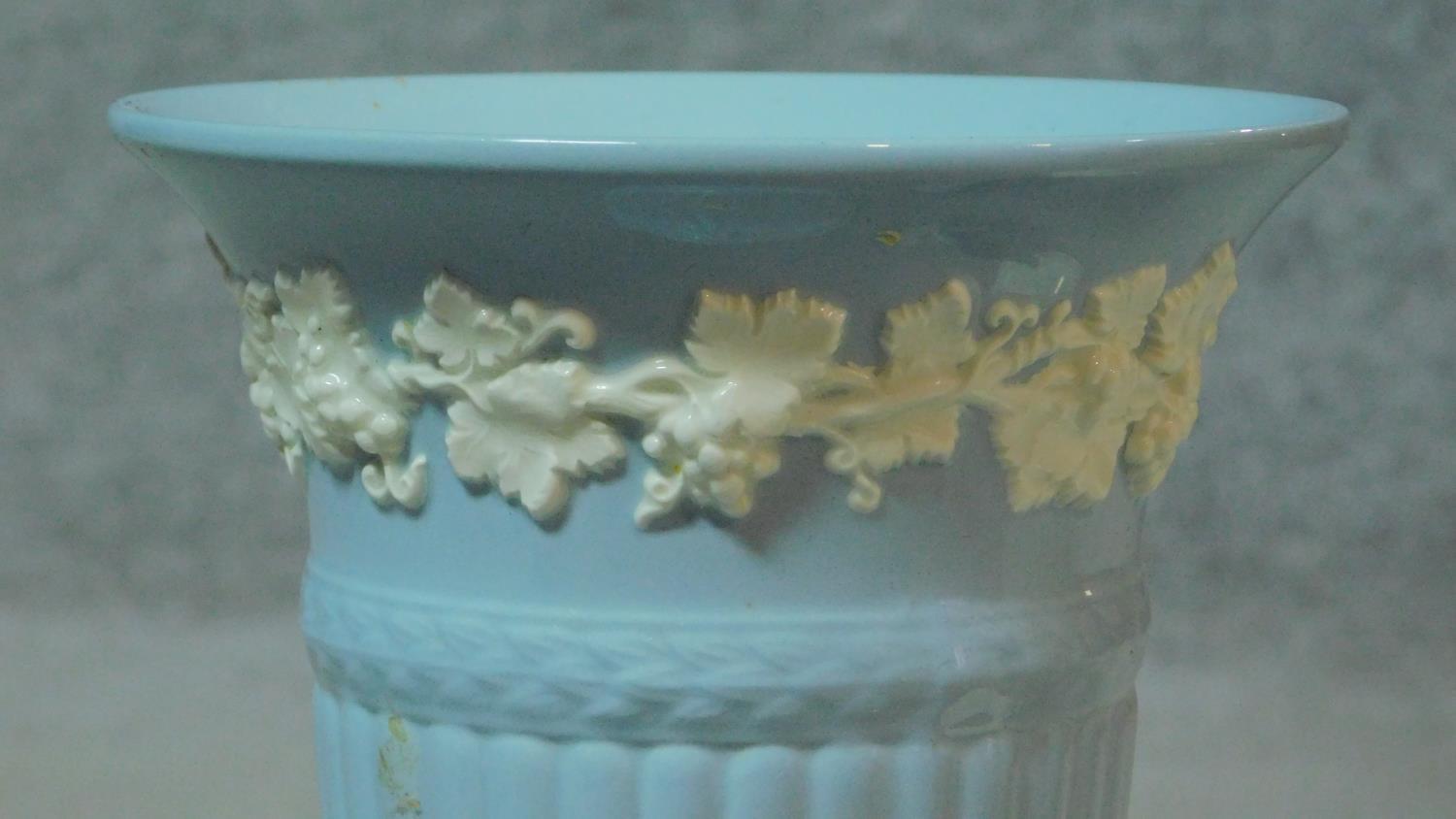 A collection of antique Wedgwood including two embossed Queensware trumpet vases along with a dark - Image 4 of 9