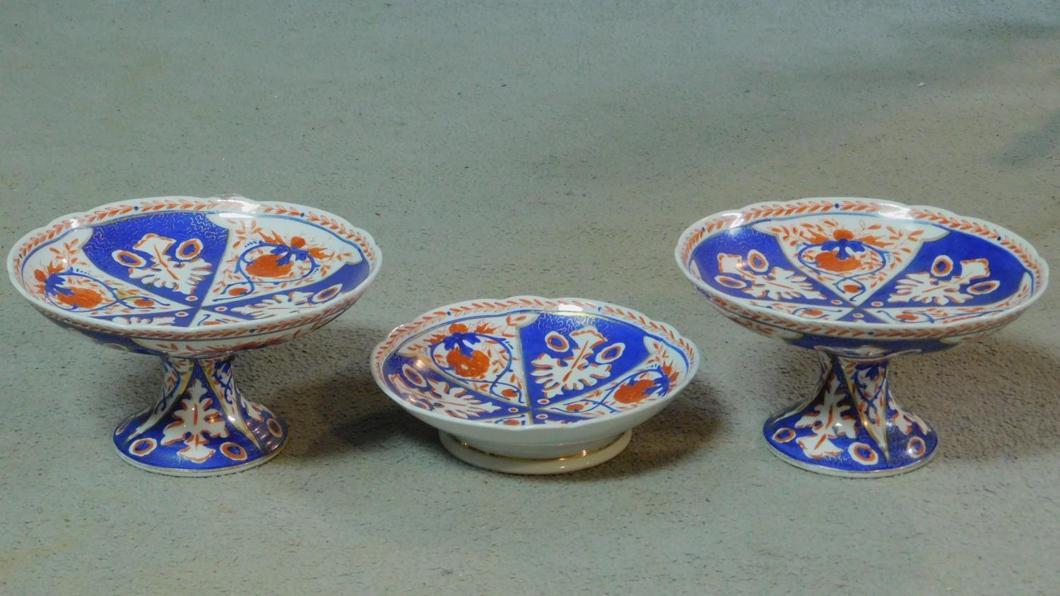 A collection of eighteen antique hand painted and gilded porcelain plates, three footed bowls and - Image 3 of 8