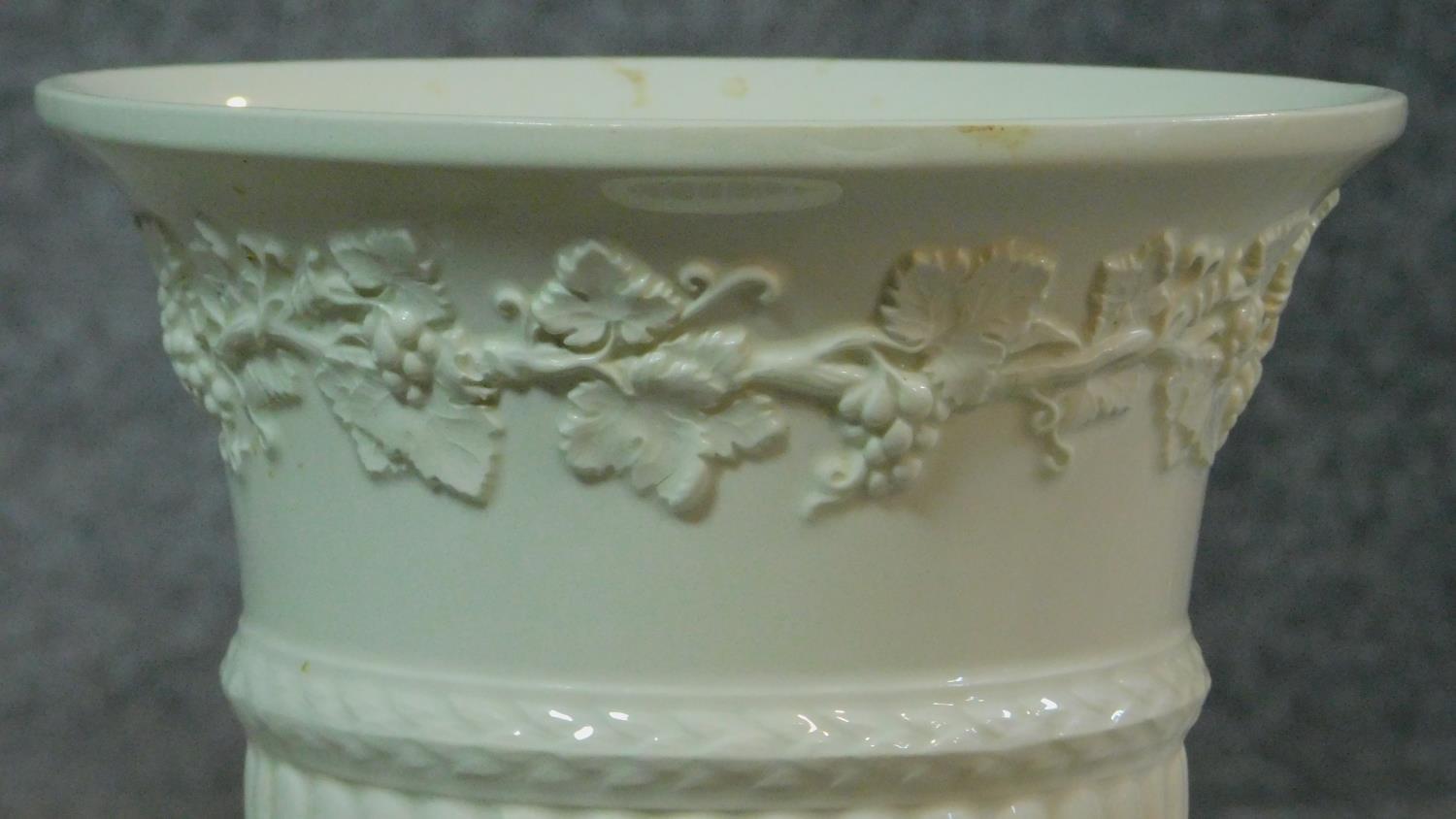 A collection of antique Wedgwood including two embossed Queensware trumpet vases along with a dark - Image 2 of 9