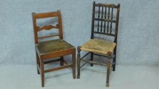 An antique country oak spindle back dining chair with woven rush seat and a country oak dining