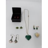 A collection of antique and vintage jewellery. Including a carved and polished heart shaped