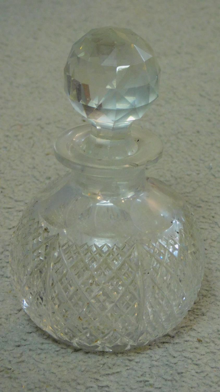 A collection of cut glass items. Including two antique diamond cut crystal perfume bottles with - Image 3 of 7
