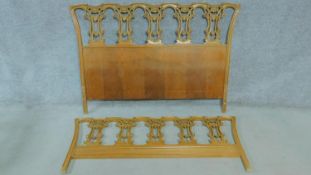 A Chippendale style mahogany triple chair back bedstead, H.109 W.160cm (lacks side bars)