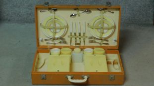 An Art Deco Braxton cream Bakelite travel picnic set. H.34 W.62 D.14cm