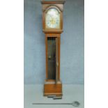 A pine cased 8 day longcase clock with brass dial, makers inscription Peter Rae of London. H.200