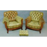 A pair of late 19th century mahogany and satinwood inlaid club armchairs in deep buttoned leather