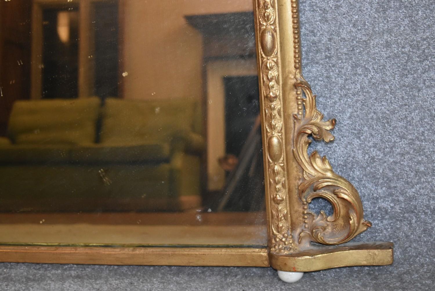 A 19th century carved giltwood overmantel mirror with scrolling foliate cresting above original - Image 4 of 5