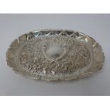 A Georgian silver repoussé tray with crossed cornucopia and floral design, stylised petal form edge.