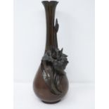 A Japanese Meji period relief bronze Iris vase. Artists signature to base. With sculpted form of