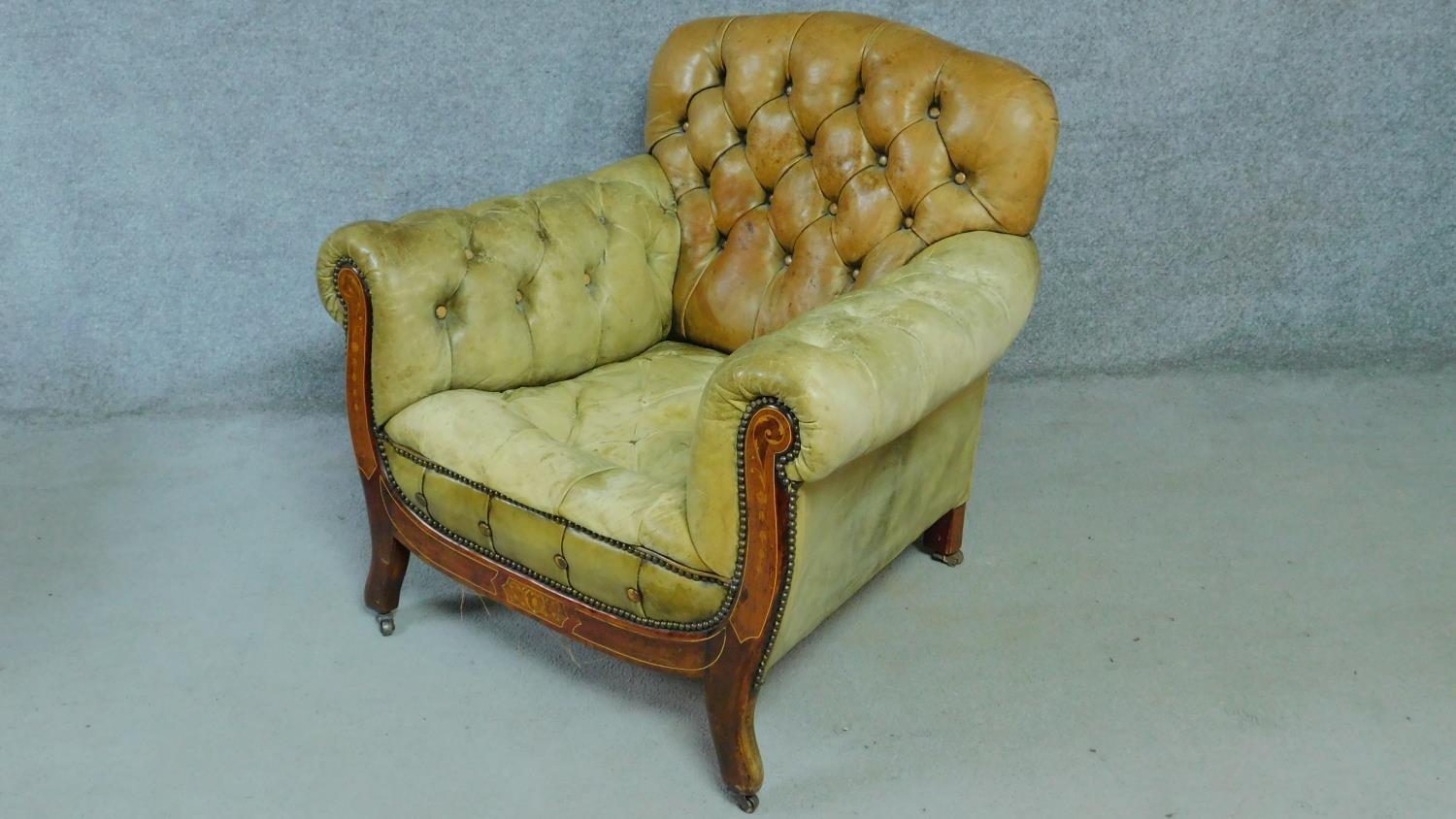 A pair of late 19th century mahogany and satinwood inlaid club armchairs in deep buttoned leather - Image 3 of 10