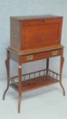 A late Victorian mahogany secretaire stationery cabinet on stand with fall front revealing fitted