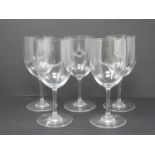 A set of five Baccarat crystal water glasses. Signed and stamped to the foot. H 15.5cm.