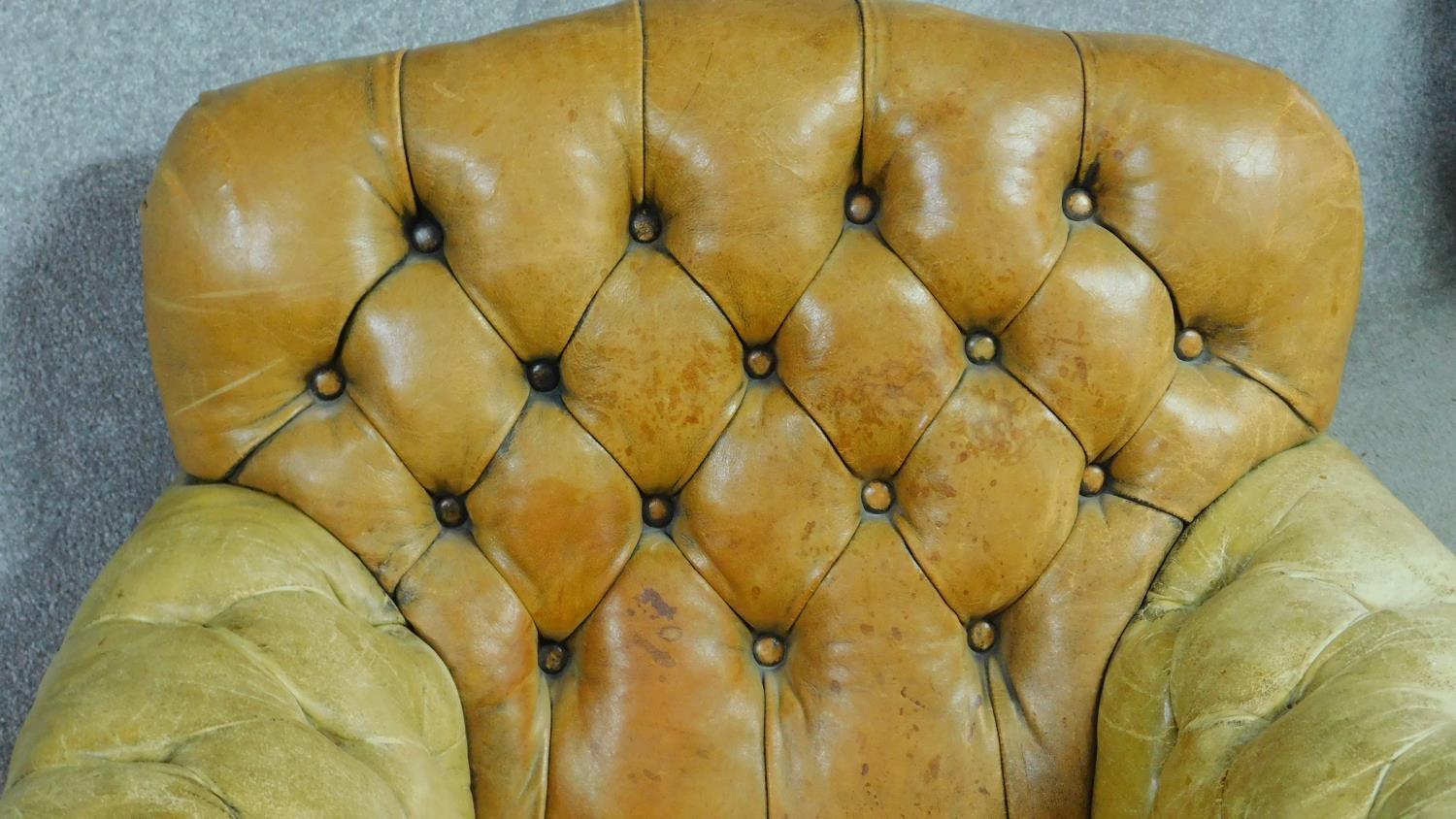 A pair of late 19th century mahogany and satinwood inlaid club armchairs in deep buttoned leather - Image 4 of 10