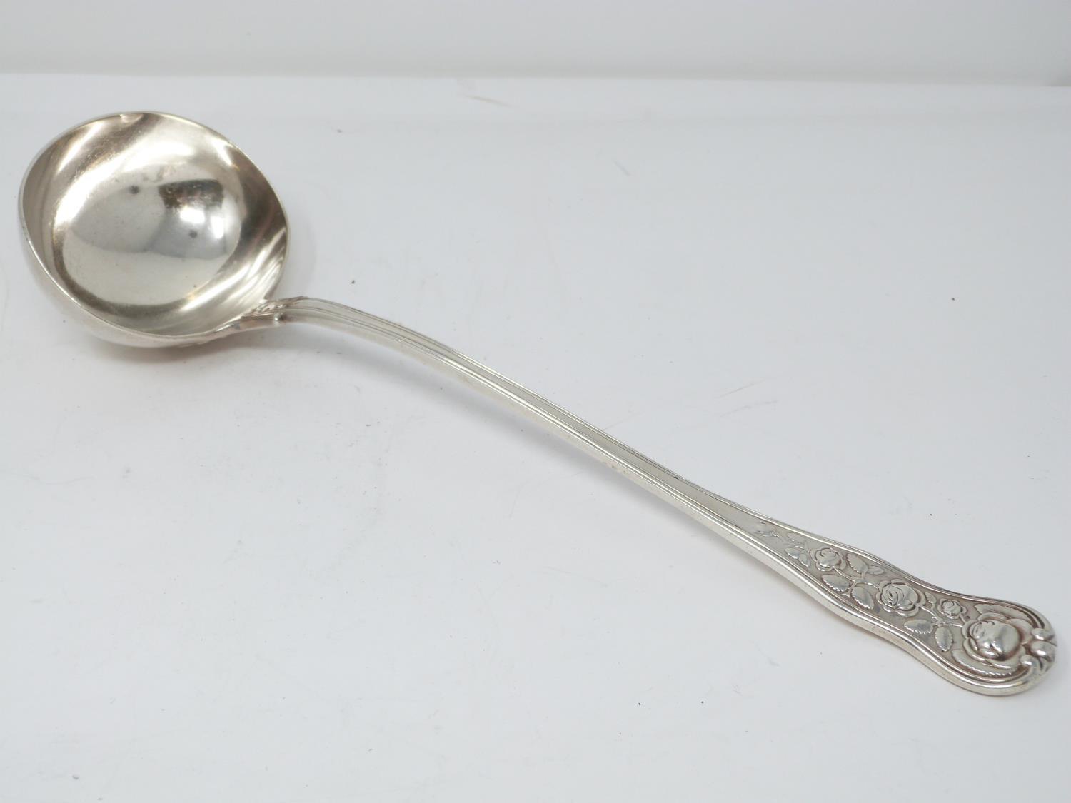 An early Victorian sterling silver soup ladle. Hallmarked: HI IL for John & Henry Lias, London 1845.