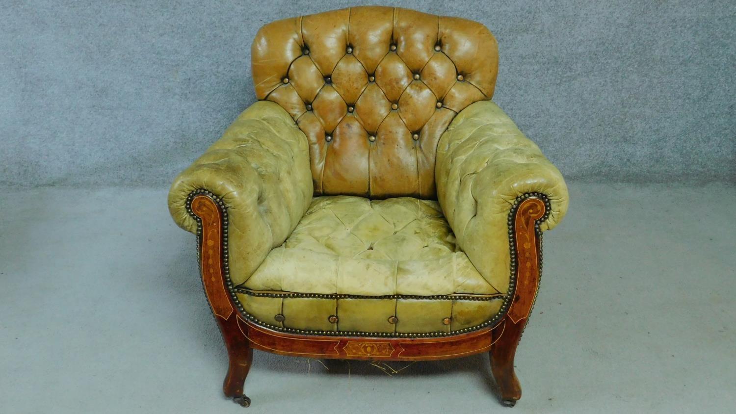 A pair of late 19th century mahogany and satinwood inlaid club armchairs in deep buttoned leather - Image 2 of 10