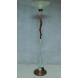 An Art Deco style standard uplighter with frosted glass shade on circular stepped base. H.194cm