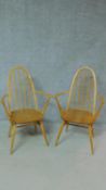 A pair of vintage beech framed Ercol Quaker Windsor armchairs with elm seats. H.96cm