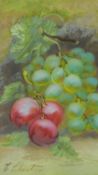 A framed oil on board still life depicting bunches of grapes. Indistinctly signed. 28x36cm